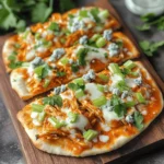 If you’re a fan of bold flavors and crispy textures, the Buffa-Licious Chicken Flatbread is a recipe you won’t want to miss. This delectable dish takes the classic buffalo chicken flavor profile and transforms it into a convenient, easy-to-make flatbread that is perfect for lunch, dinner, or as a crowd-pleasing appetizer. With its roots in the iconic buffalo chicken wings, this flatbread brings all the spicy, tangy, and creamy elements that have made buffalo-flavored dishes a staple in American cuisine.