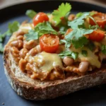 If you're on the hunt for a dish that perfectly marries comfort food with nutritional goodness, look no further than Cheesy Masala Beans on Toast. This delightful recipe showcases a fusion of flavors that tantalizes your taste buds while offering a wealth of nutrients. Imagine rich, creamy cheese melting into a savory, spiced bean mixture, all served atop a crispy slice of perfectly toasted bread. It's not just a meal; it’s an experience that can elevate any breakfast, lunch, or quick dinner into something special.